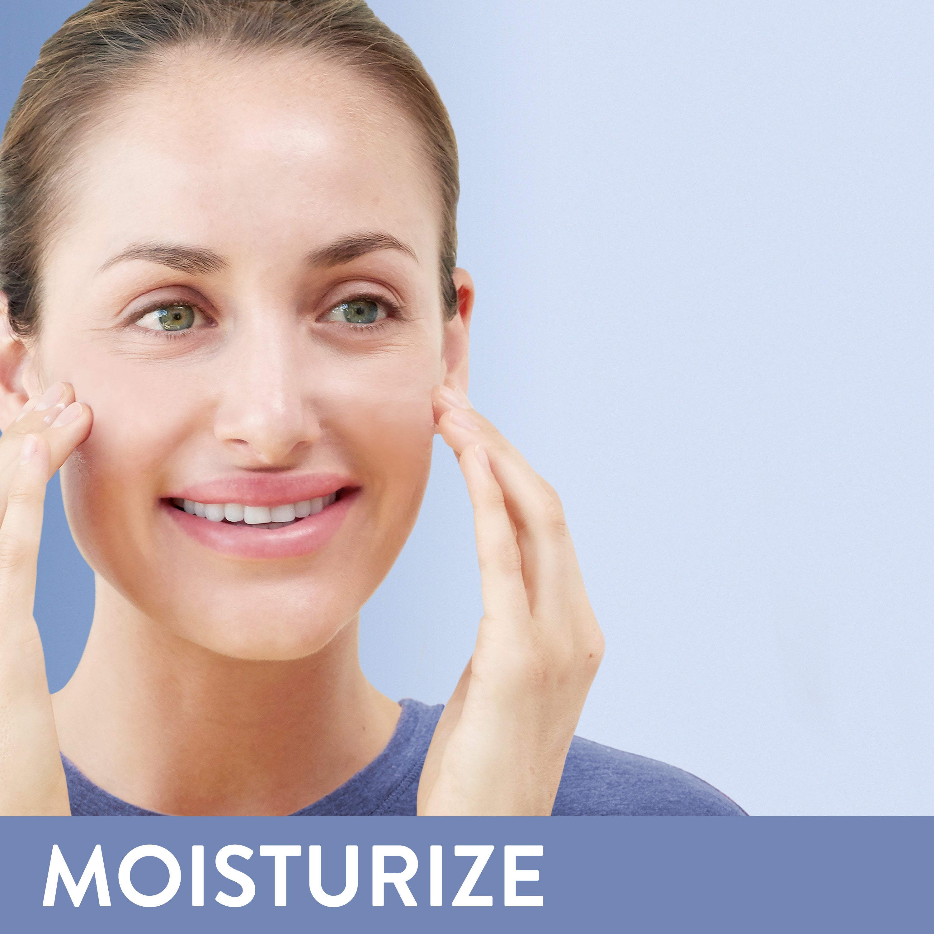 woman moisturizing face